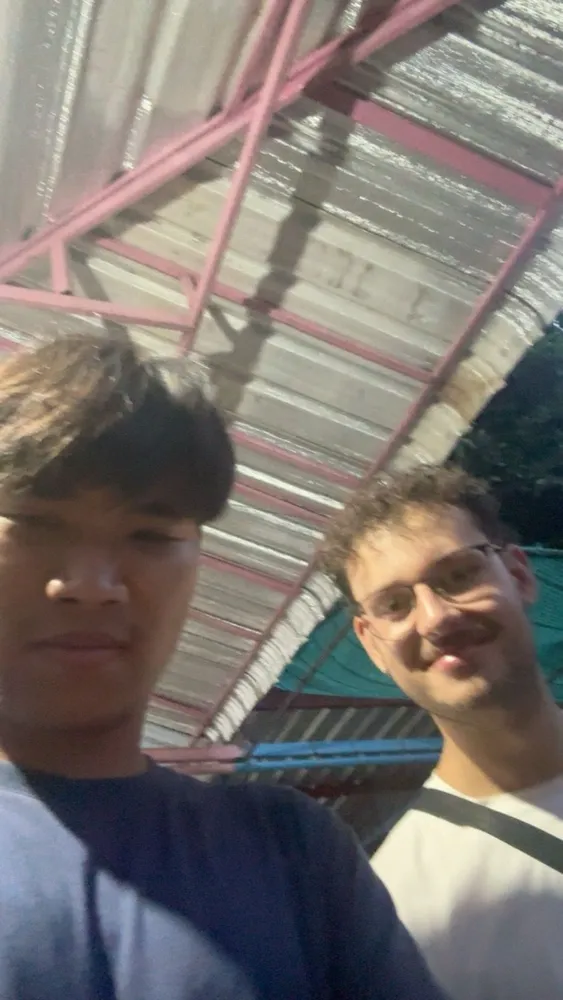 Two friends together at the sports ground