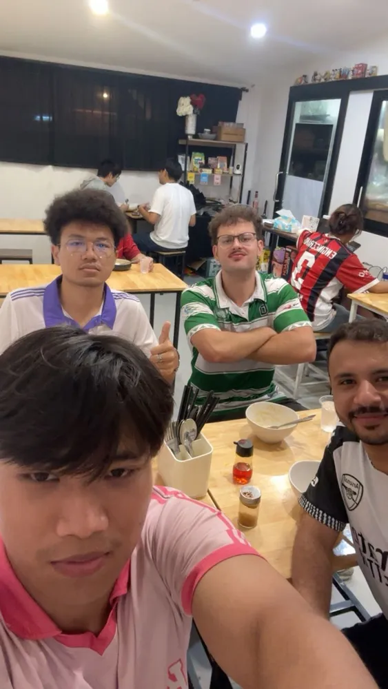 Friends gathered around a restaurant table