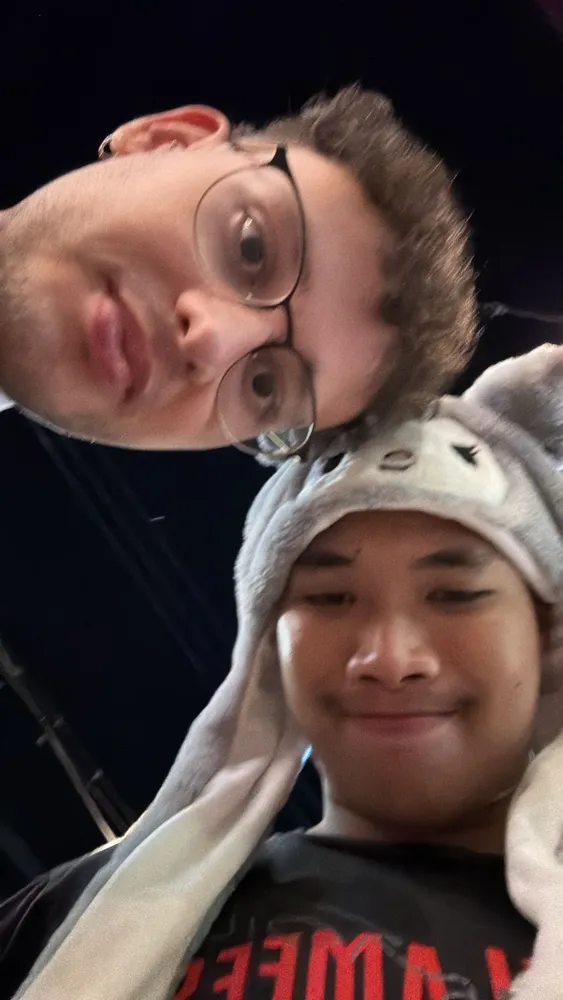 Two friends taking a low-angle selfie