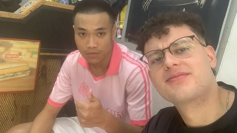 Two friends taking a selfie indoors